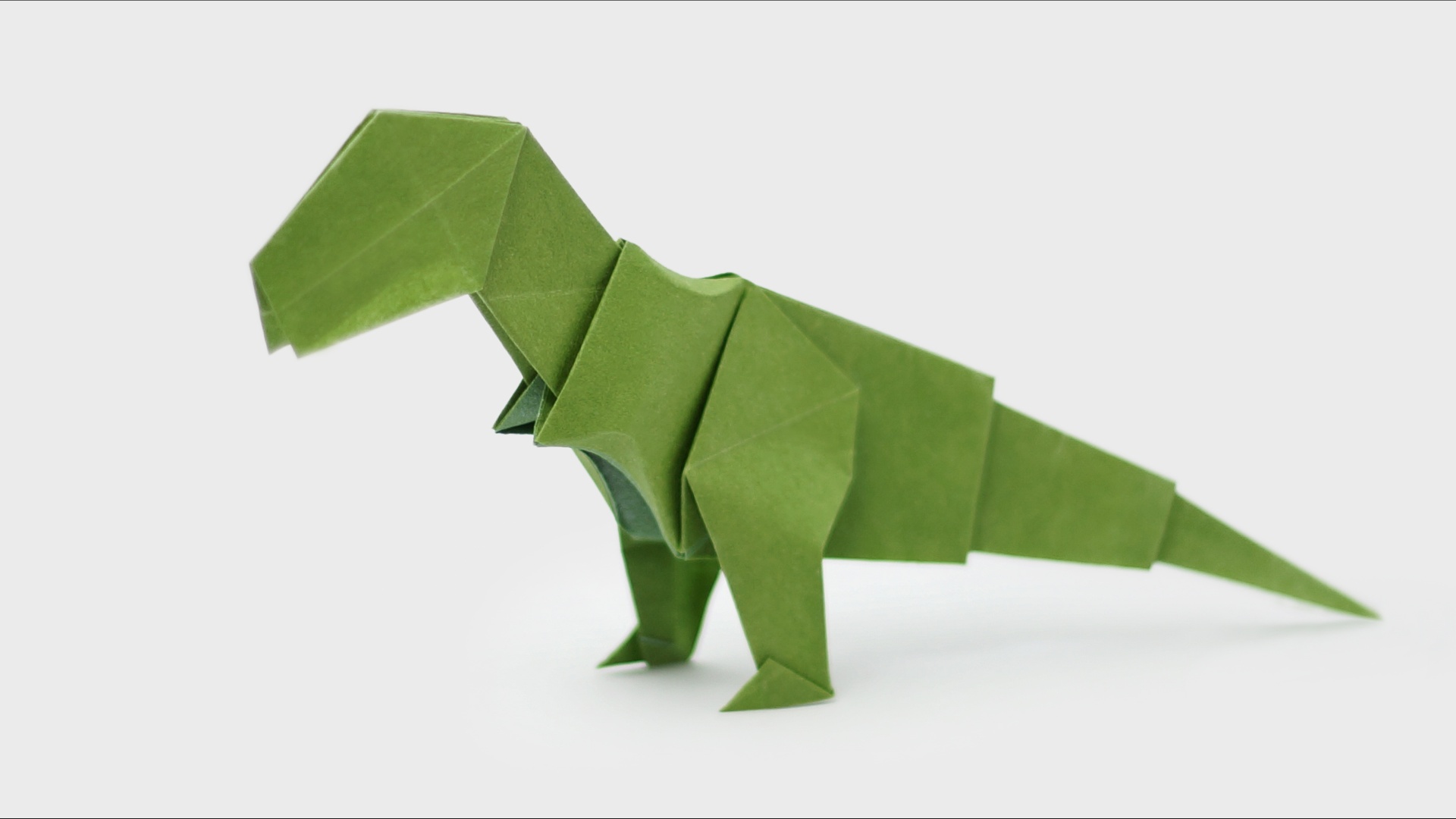 This is an origami tyrannosaur you will totally be able to make by visiting the Makerspace